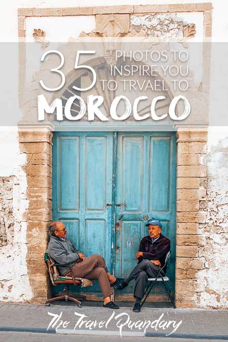 Pin Photo: Morocco Travel Photography | 2 men sit in front of a blue door in Essaouira