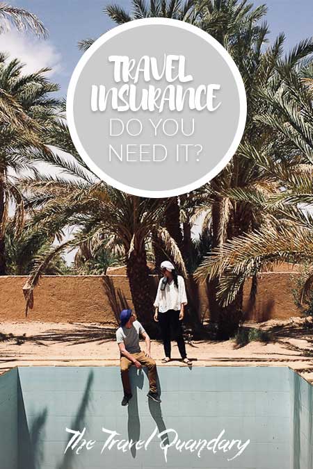 A couple sitting on the edge of an empty pool surrounded by palm trees, Morocco