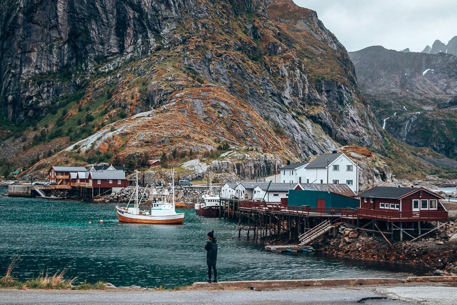Jasmine standing at the harbour of Hamnoy - Lofoten Islands, Norway