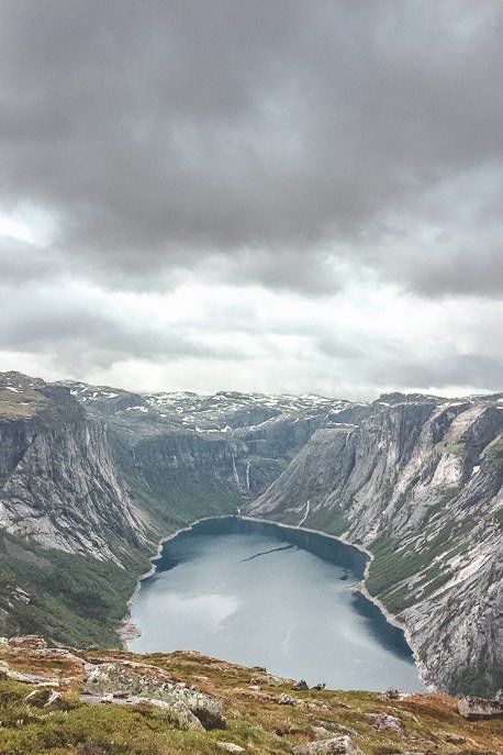 The view out over the fjord under misty skies - Trolltunga, Norway