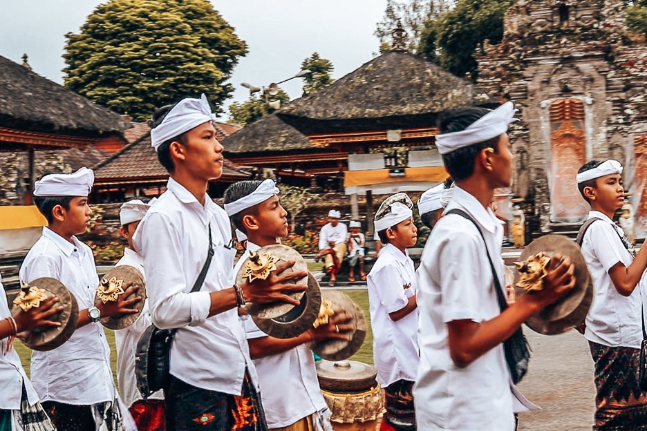 Young boys play music coming into Danu Beratan Temple, Bali Gallery