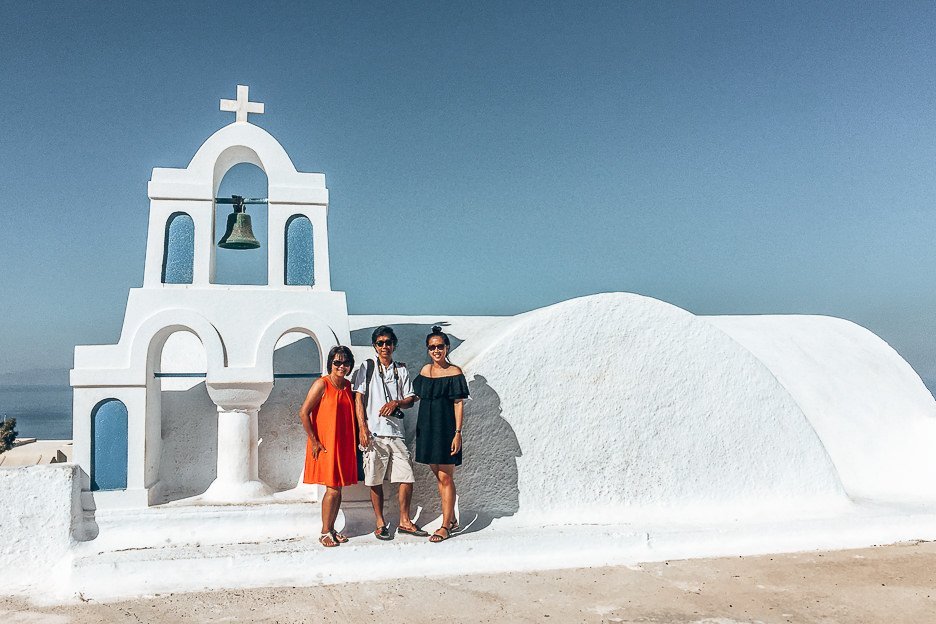 Jasmine with her parents in Santorini, Greece - Travelling with Parents