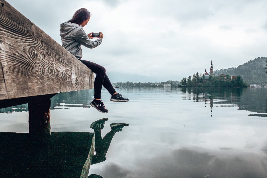 Taking an iPhone photo of Bled Island, Bled Lake, Slovenia