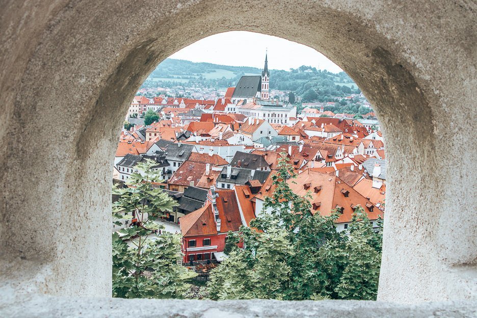 Through an arched window. Looking out over the town of Cesky Krumlov, Czech Krumlov