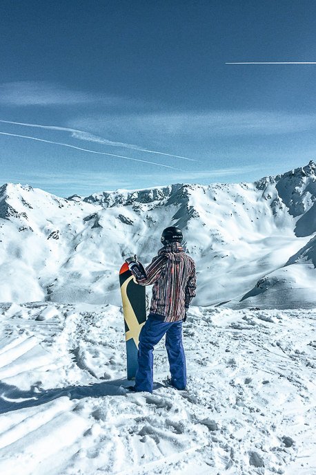 Bevan taking in the views with his snowboard at Val Thorens, France