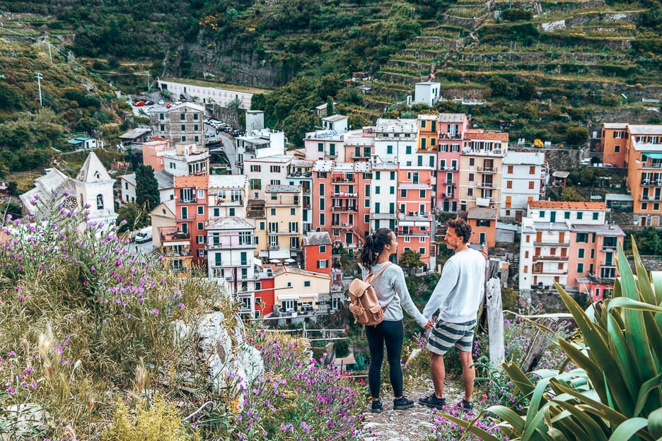 Holding hands and admiring the view of Manarola, Cinque Terre