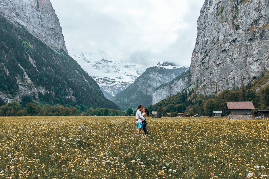 Sharing a kiss in a field of wildflowers, Interlarken Switzerland