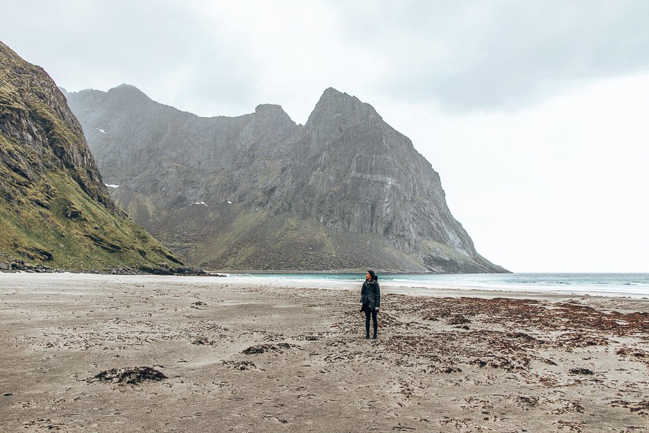 Jasmine standing on Khalika Beach - Lofoten Islands, Norway