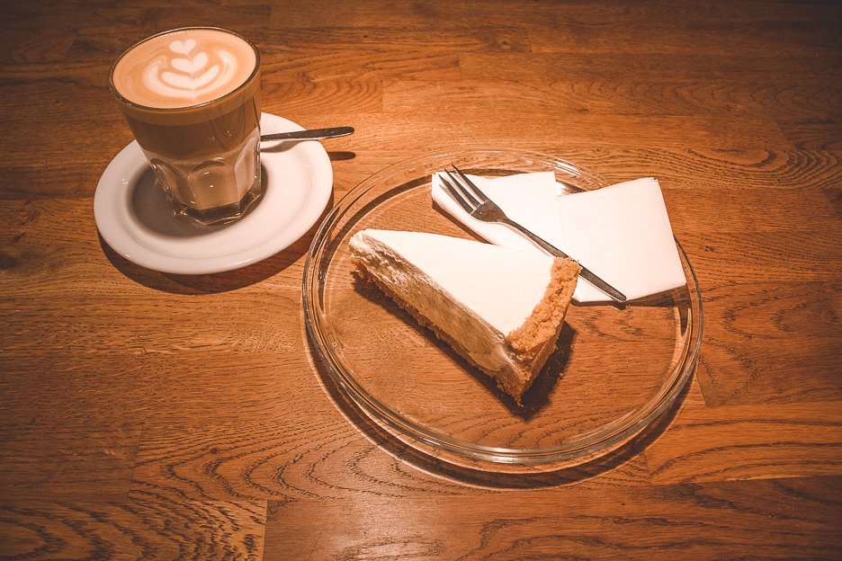 A latte and slice of cheesecake at Five Elephant, Berlin Germany - best coffee in Europe