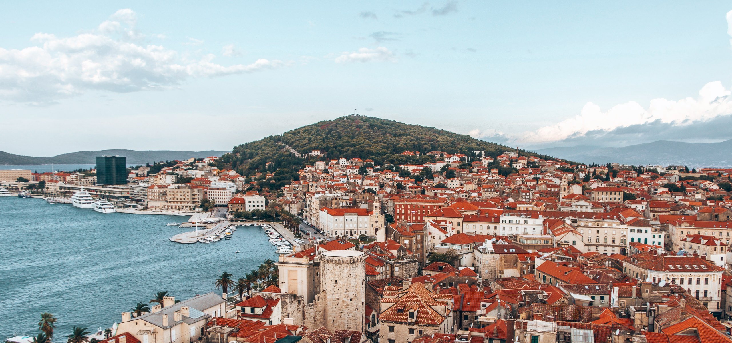 Birds eye view of the red roofs of Split and the harbour in Split, Croatia