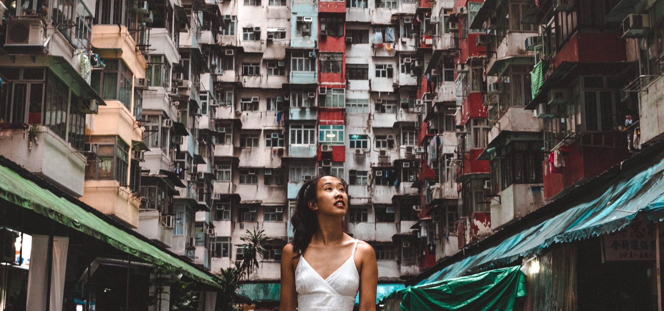 A girl poses in front of Montane Mansion, Hong Kong