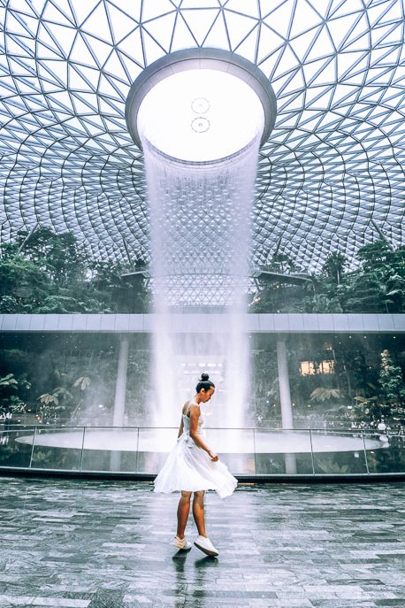 Twirling in front of the waterfall at Jewel Changi Airport