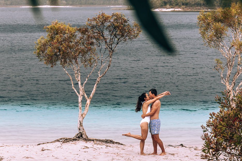 Sharing a kiss on the sand at Lake McKenzie, Fraser Island